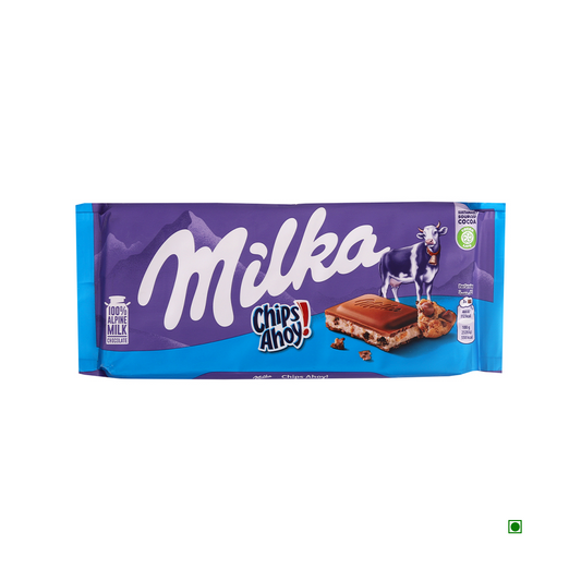 Milka Chips Ahoy Bar 100g with a purple and blue packaging featuring a cow and cookie pieces. This delightful treat combines Milka chocolate bars' creamy goodness with the irresistible crunch of biscuits and chocolate pieces.