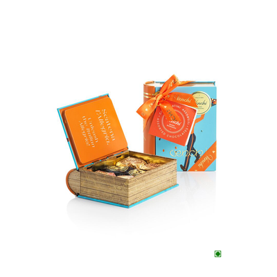 A Venchi Vintage Mini Book Gentleman with Assorted Chocoviar 116g box of chocolates with an orange ribbon.
