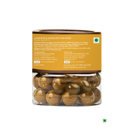 A canister of Rhine Valley Almond & Hazelnut Blonde Dragees 100g visible through clear packaging.