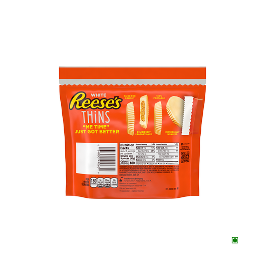 Image of a bag of Hershey's Reese's Thins White Creme Peanut Butter Cups 208g with nutritional information and ingredients listed on the back. The orange bag features images of the white chocolate Peanut Butter Cups.