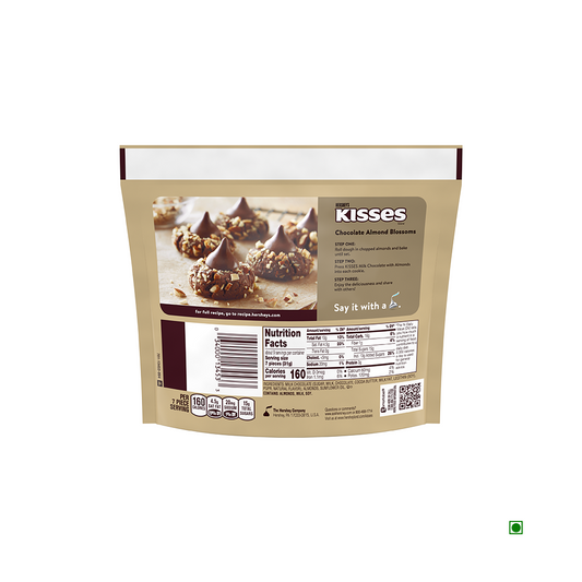 A brown bag of Hershey's Hershey's Kisses Milk with Almonds Bag 283g with a visible nutrition facts label and an image of the crunchy almond cookies on the back. The bag is shown against a white background.