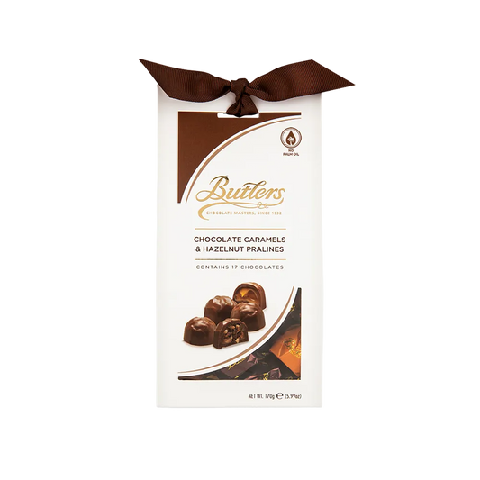 A Butlers Caramel & Praline Twistwrap 170g chocolate bar with a bow on it.