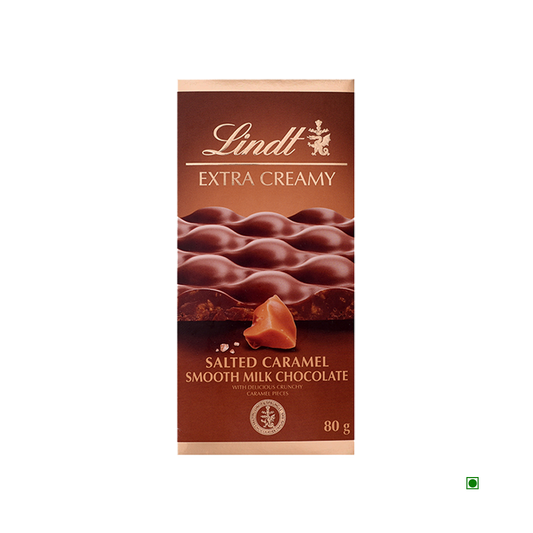 Lindt Extra Creamy Salted Caramel Tablet 80g by Lindt, featuring caramel pieces on the wrapper. Made in France and proudly showcasing its French origin.