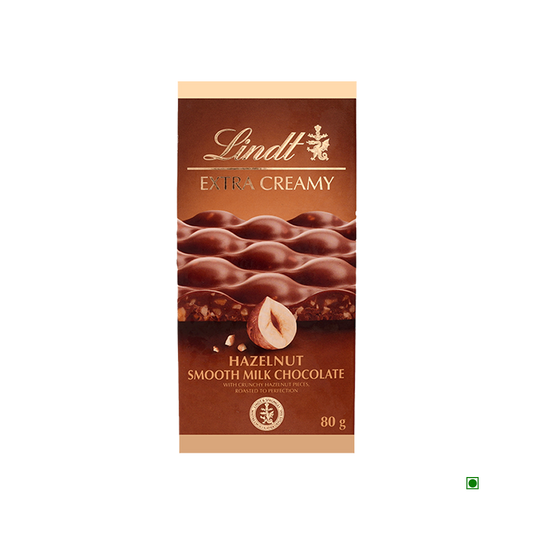 Lindt Extra Creamy Hazelnut & Sea Salt Tablet 80g by Lindt features chocolate pieces and hazelnuts on its packaging and highlights France as the country of origin.