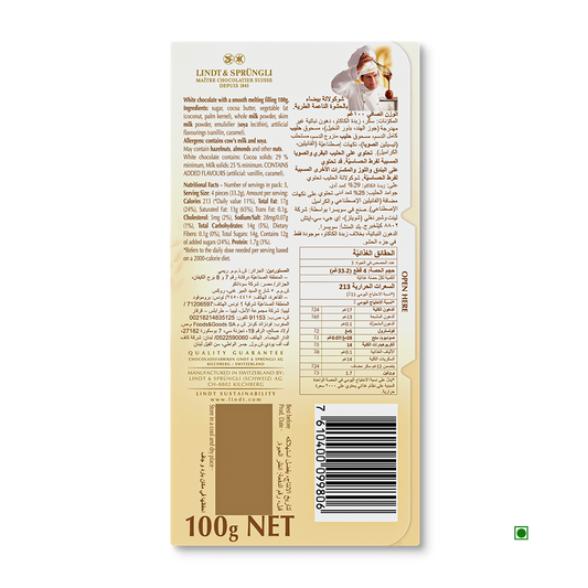 Back of a Lindt Lindor White Tablet 100g package by Lindt, displaying ingredients, nutrition facts, barcode, and text in English and Arabic.