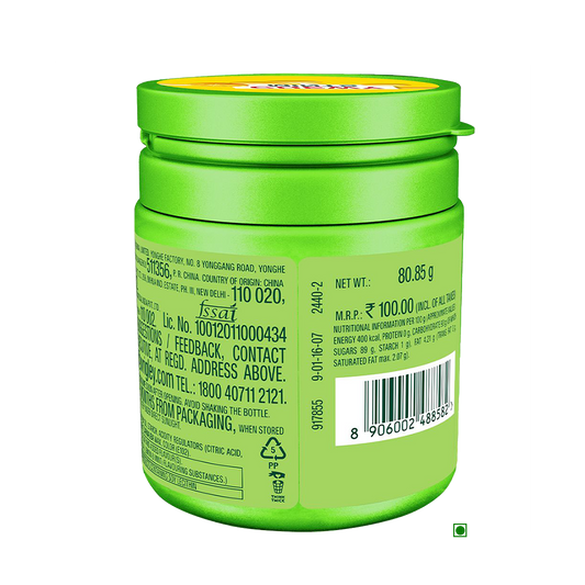 A green jar with a label on it containing Wrigley's Doublemint Chewy Mints, Lemon, 80.85g.