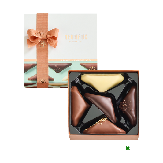A box of Neuhaus Discovery Irresistibles 104g chocolates in a white box.