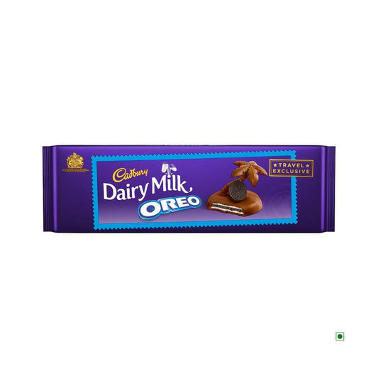 A Cadbury Dairy Milk Oreo Bar 300g package in purple displays a chocolate piece with Oreo biscuit filling and features a travel exclusive label.