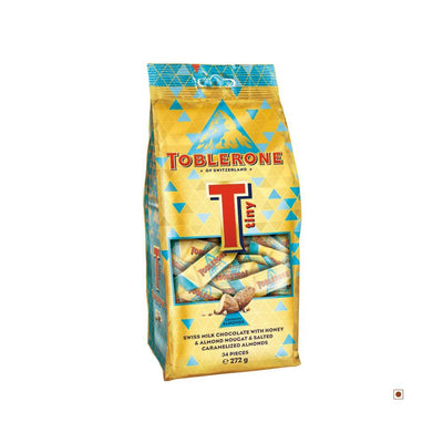 A bag of Toblerone Tiny Crunchy Almonds Bag 272g on a white background.