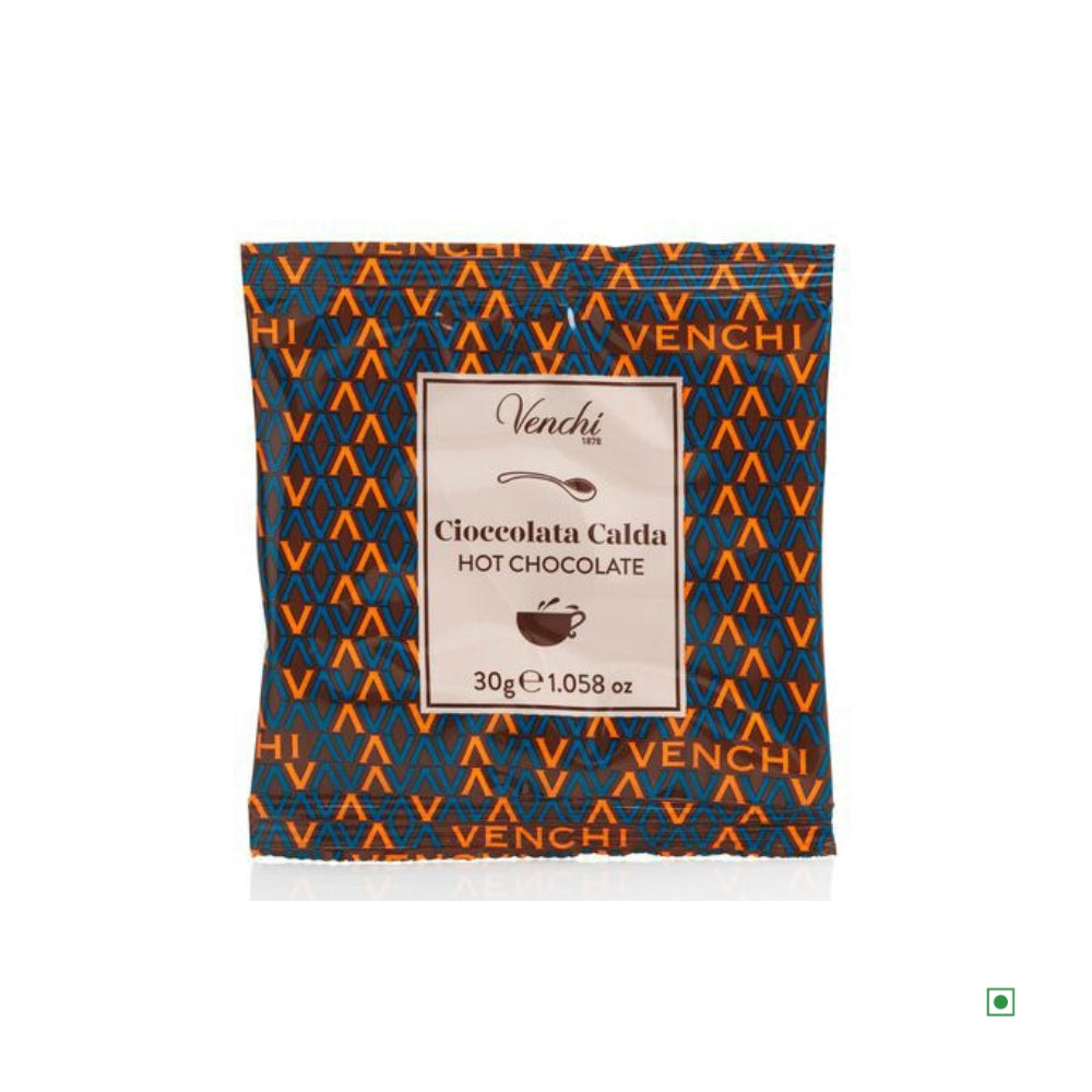 A 30g packet of Venchi Single Dose Hot Chocolate, made in Italy, features an orange and blue geometric pattern.