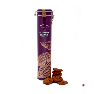 A purple tin with Cartwright & Butler Chocolate Brownie Biscuits inside.
