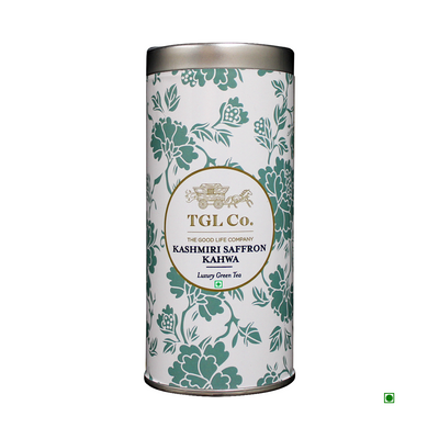 Decorative tea tin labeled "Cococart India Kashmiri Saffron Kahwa 35g" with floral patterns in green and silver, embodying the essence of Kashmir valley beverage.
