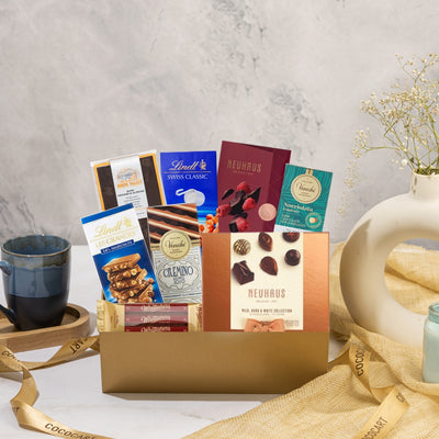 Treat yourself or your loved ones to a delectable Diwali collection of chocolates and a cup of coffee, elegantly presented in a gold box. Indulge in the irresistible Santa's Sweet Selection Giftbox by Gift Hampers.