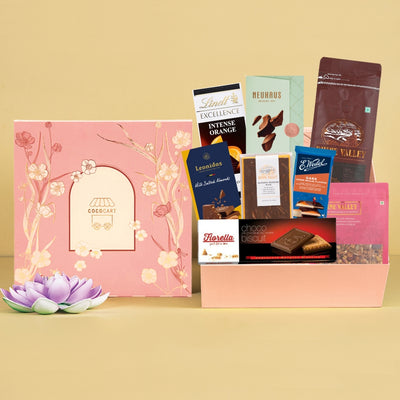 A pink gift box filled with The Blossom Premium Hamper chocolates from Gift Hampers.