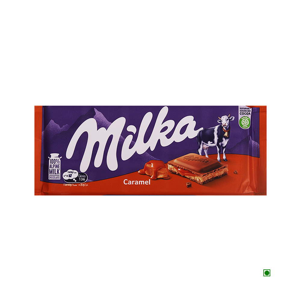 Milka Caramel Milk Chocolate Bar 100g in purple and orange packaging features an illustration of a cow on the right and pieces of milk chocolate with creamy caramel filling on the bottom center.