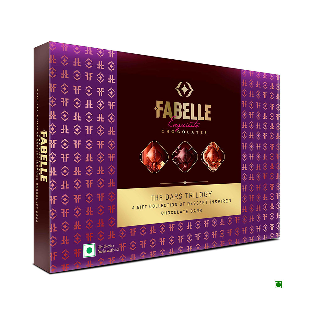 A purple box of Fabelle The Bars Trilogy With Tiramisu 386g from India displays images of three chocolate bars and a green logo.