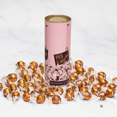 A tin filled with Pick & Mix: Lindor Hazelnut 100/250/500g candies by Lindt.