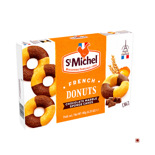 Box of St Michel French Donuts Choco Marble 180g, featuring rich baked chocolate cake in marble sponge form. The packaging showcases images of the delicious donuts and proudly notes that it is made in France.