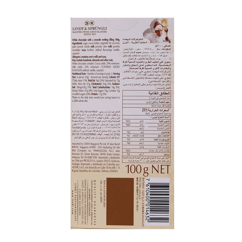 Back view of a Lindt Lindor Singles Weiss White 100g chocolate bar wrapper with nutritional information and ingredients listed in multiple languages, including a logo and barcode.