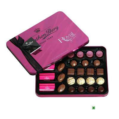An Anthon Berg pink tin with Anthon Berg Royal Selection 300g chocolates in it.