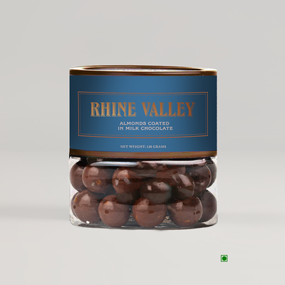 A jar of Rhine Valley Almond Milk Dragees 120g with the word Rhine Valley on it.