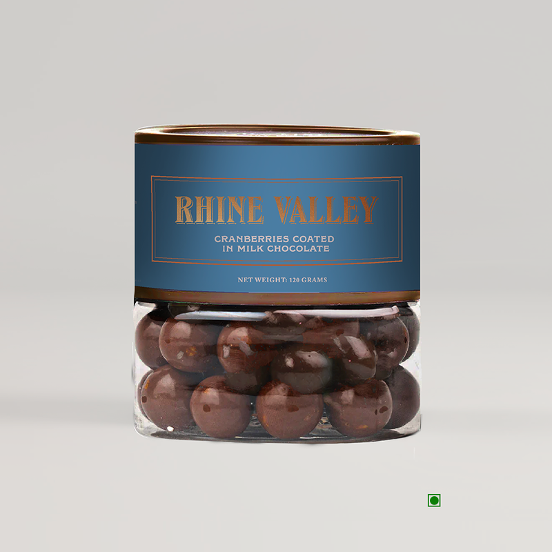 Rhine Valley Cranberry Milk Dragees 120g with creamy milk chocolate and cranberries in a jar on a white background.