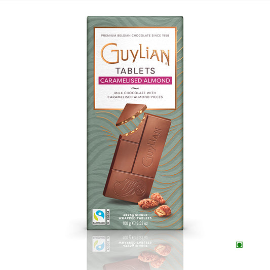 The Guylian Caramelised Almonds Milk Chocolate Tablet 100g, created in Belgium, features green and gold packaging with almond illustrations.