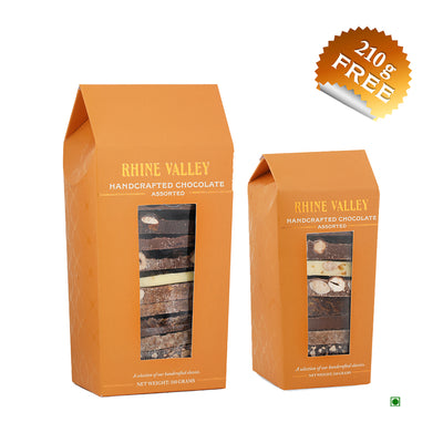 Two boxes of Rhine Valley Assorted Fresh Chocolate 310g + 210g FREE with the words house valley on them.