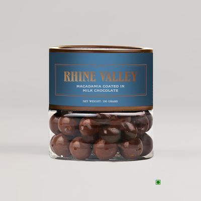 Creamy Rhine Valley milk chocolate with Rhine Valley Macadamia Milk Dragees in a jar on a white background.