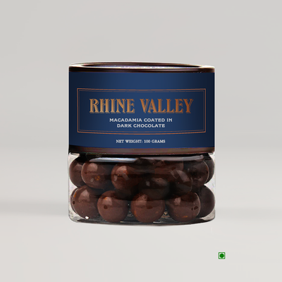 A jar of Rhine Valley Macadamia Dark Dragees 100g with the word "Rhine Valley" on it, highlighting its origin.