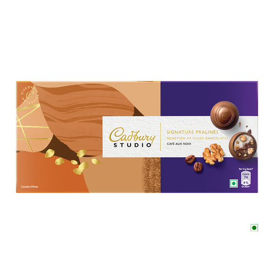 The Cadbury Brownie 130g - 10 Pralines box, crafted in India, features an elegant design showcasing assorted filled chocolates and nuts on the packaging.