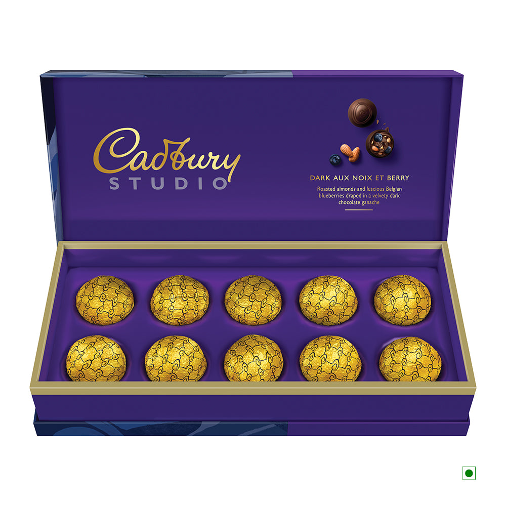 Open the Cadbury Assortment Box, containing 18 pralines expertly crafted to showcase rich flavors with care in India, emphasizing its heritage as the proud country of origin.