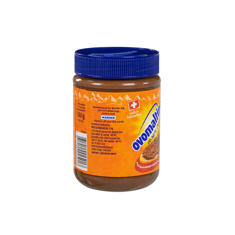 A jar of Ovomaltine Spread Crunchy Cream 380g isolated on a white background, showing nutritional information and brand logo.