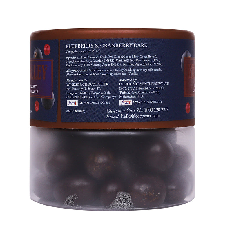 Jar of Rhine Valley Blueberry & Cranberry Dark Dragees 100g with ingredient list and company contact information on the label.