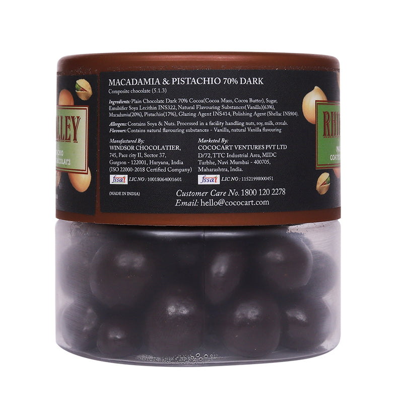 A jar of Rhine Valley Macadamia & Pistachio 70% Dark Dragees spread with ingredients and nutritional information listed on the label.