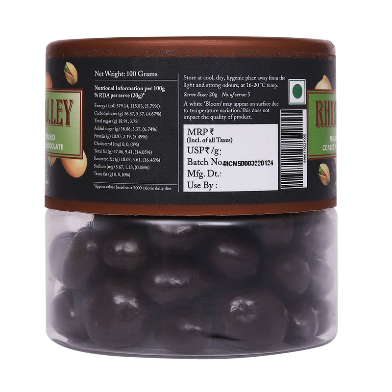 Transparent jar of Rhine Valley Macadamia & Pistachio 70% Dark Dragees 100g with nutritional info and company branding visible.