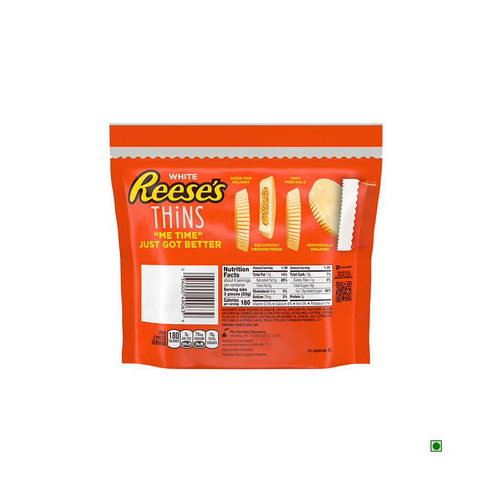 The packaging for Reese's Thins White Creme Peanut Butter Cups 208g features the front label adorned with an enticing product image and nutritional facts, all set against a vibrant orange background.