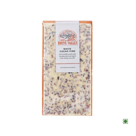 A pack of Rhine Valley White Chocolate with Crunchy Cocoa Nibs 100g, labeled "White Cacao Hillys", against a white background.