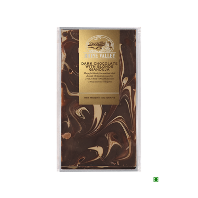 A bar of Rhine Valley 70% Dark Chocolate with Blonde Gianduja, in marbled packaging, displayed in a vertical format.