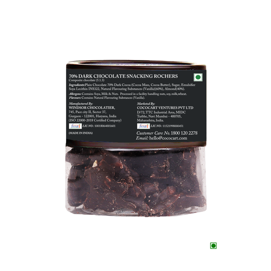 A jar of Rhine Valley 70% Dark Chocolate Snacking Rochers 90g with a visible ingredients label, featuring rich dark chocolate pieces made in India. This exquisite product is crafted by Windsor Chocolatier and CocoaCraft Ventures.