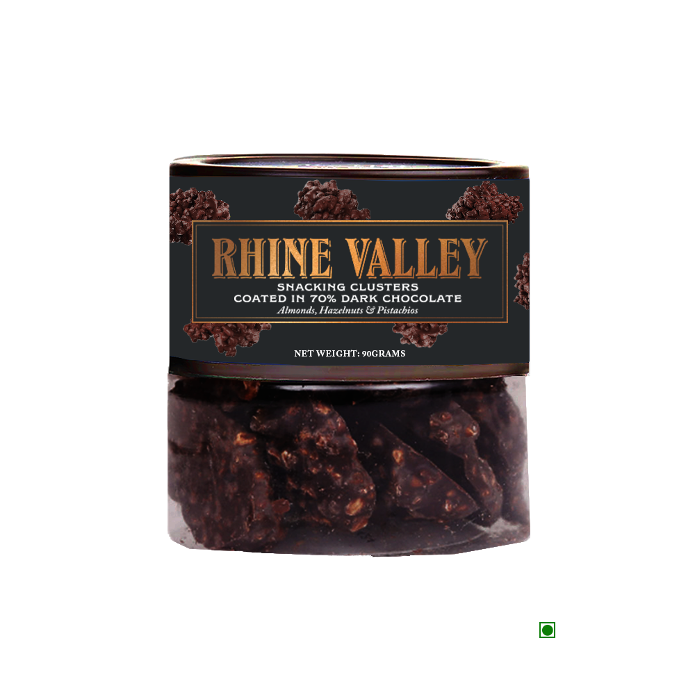 Rhine Valley 70% Dark Chocolate Snacking Clusters 90g in a clear plastic container with a black and brown label, featuring the text "Coated in 70% Dark Chocolate - Almonds, Hazelnuts & Pistachios." Net Weight: 90 grams.