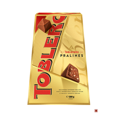 Box of Toblerone Praline Box 380g, featuring an image of milk chocolate candies on a golden package, with a weight indication of 330 grams.