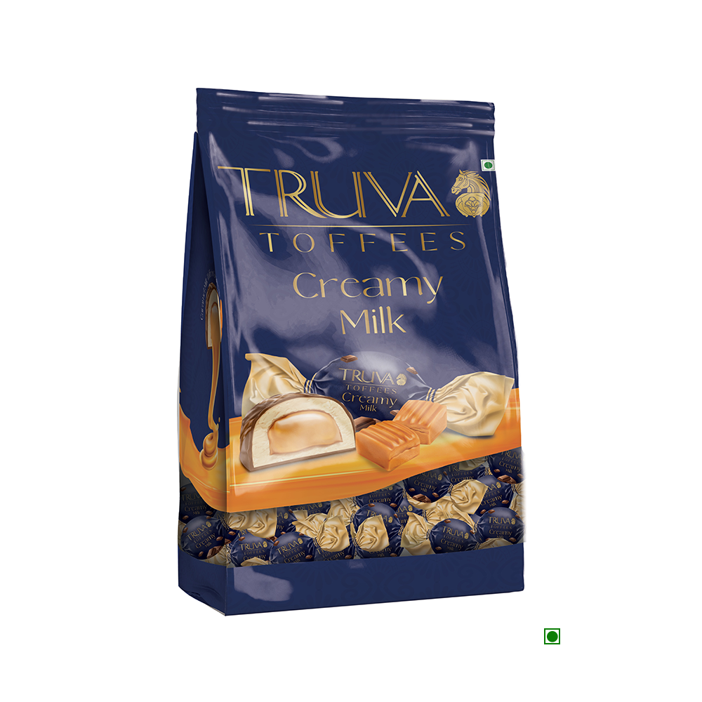 A Truva Milky Fondante Bag (1000g) featuring a blue and orange design, labeled "Creamy Milk," containing individually wrapped fondant toffees.