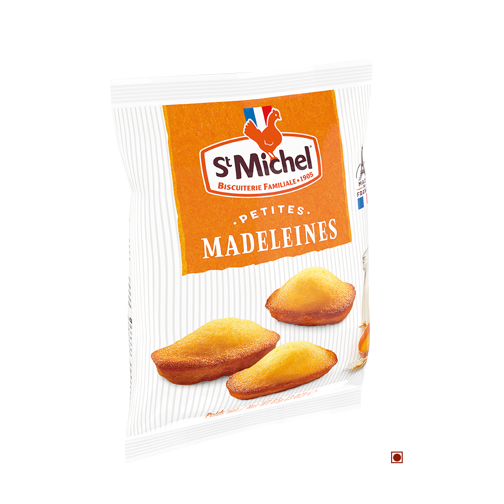 A pack of St Michel Mini Madeleines Sponge Cake Bag 85g, featuring an image of three madeleines on the front. The orange and white packaging proudly displays the St Michel logo at the top, highlighting that these delightful treats from France are made using cage-free eggs.