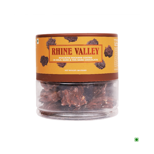 A container labeled "Rhine Valley New Snacking Rochers Assorted 200g" holds delectable snacking rochers coated in a rich assortment of milk dark chocolate and 70% dark chocolate. Net weight: 200 grams.