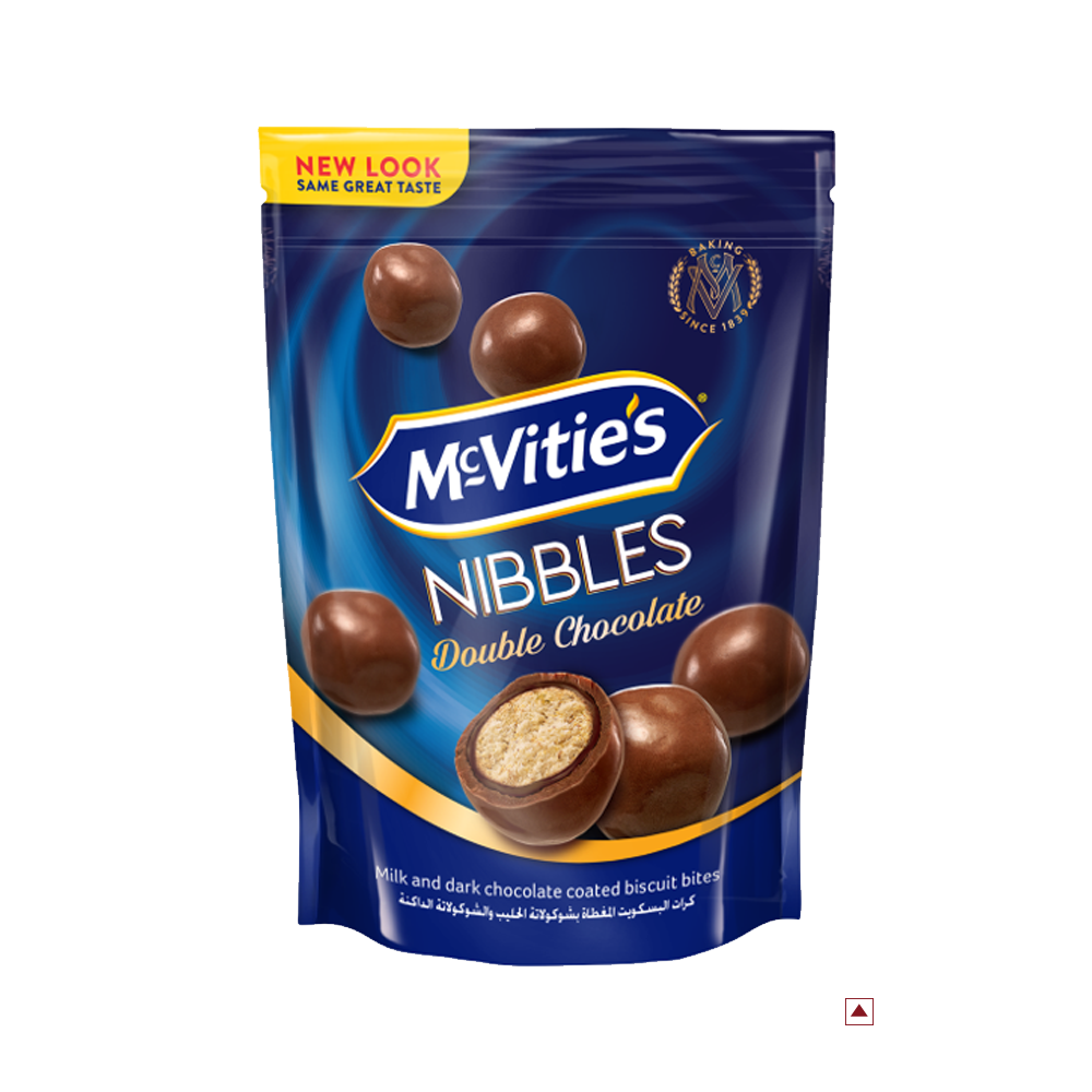 A stand-up pouch of McVitie’s Nibbles Double Chocolate 110g in blue, showcasing an assortment of milk and dark chocolate-coated biscuit bites, made proudly in Egypt.