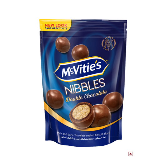 A stand-up pouch of McVitie’s Nibbles Double Chocolate 110g in blue, showcasing an assortment of milk and dark chocolate-coated biscuit bites, made proudly in Egypt.