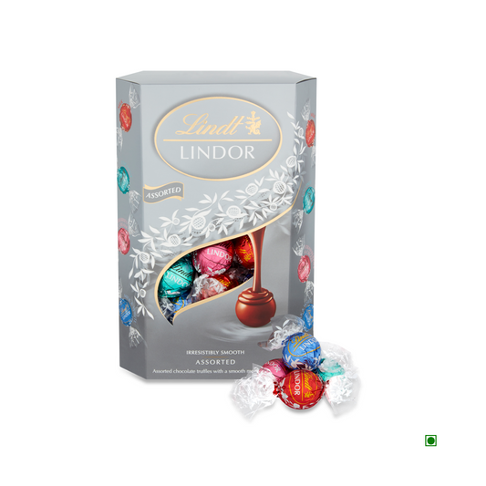 A 337g box of Lindt Lindor Chocolate Cornet Assorted Silver featuring an elegant package design with individually wrapped chocolates and flavors inspired by Switzerland. Ideal as a luxurious gift.