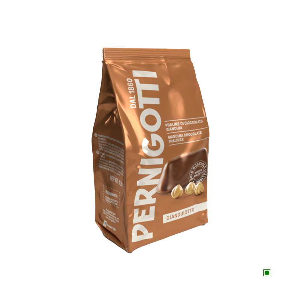 A Pernigotti Gianduiotto Classic Bag (140g) is showcased, adorned with text and images that emphasize the distinctive Gianduia chocolate and hazelnuts, renowned for their unique shape. Enjoy this Italian delicacy elegantly packaged by Pernigotti in Italy.