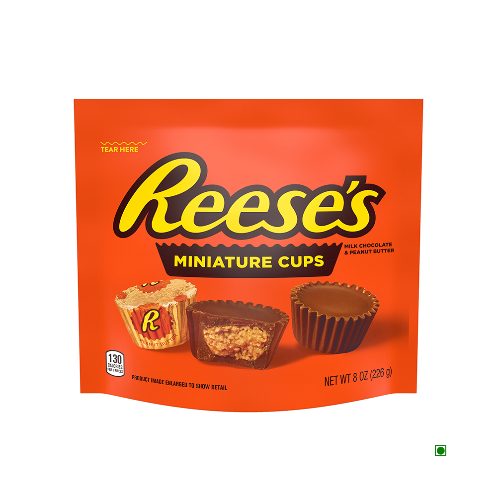 Enjoy the red bag of Hershey's Reeses Peanut Butter Cup Bag 226g, showcasing a blend of smooth milk chocolate and creamy peanut butter, all proudly made in the USA. This delightful treat combines Hershey's Milk Chocolate with the iconic Reese’s flavor.